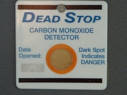 Cover art for Dead Stop #1, featuring a ghostly figure with glowing eyes over a crashed car.