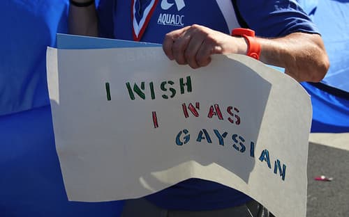 Cover art for the graphic novel GAYSIANS by Mike Curato, featuring illustrations of diverse queer Asian individuals.