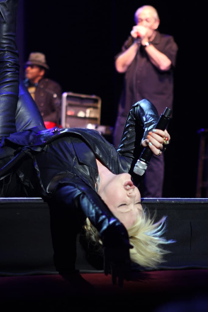 Promotional image for Mattel's Cyndi Lauper WWE action figure 3-pack, depicting Lauper on Roddy Piper's Pit.
