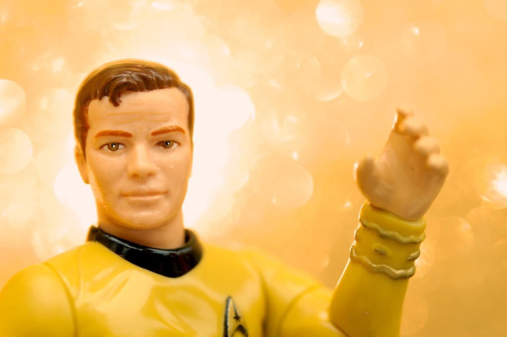 Promotional image for The Nacelle Company's Star Trek Wave 1 action figures, showcasing several characters and their unique accessories like Livingston the fish